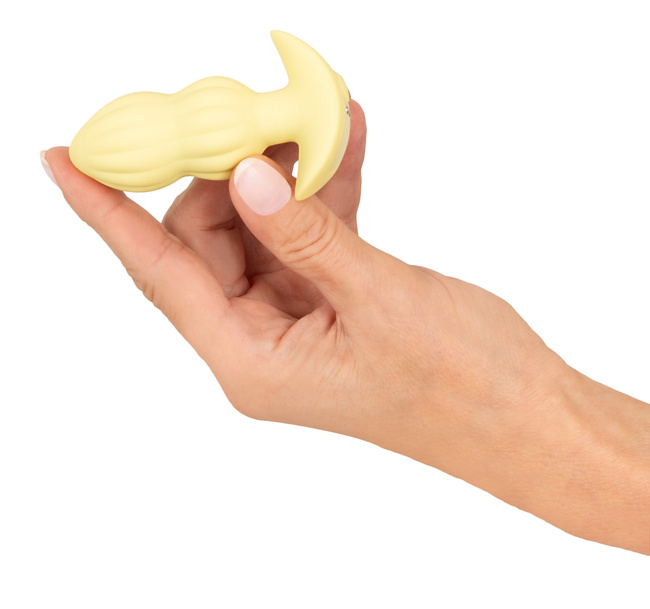 Wibrujący pieszczoch analny Cuties. Rowkowany, o zmiennej grubości, kolor żółty, silikon