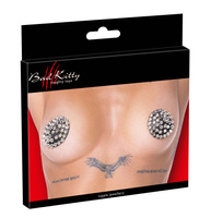 Nakładki naklejki na sutki. W stylu punk, w kształcie czarnych kół z metalowymi ćwiekami, 2 sztuki