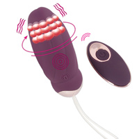 Purpurowe jajeczko z wibracjami i potrójnym wirującym pierścieniem koralików, dł. 9 cm, Ø 3,4 cm